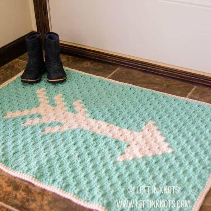 A crochet arrow rug in an entryway