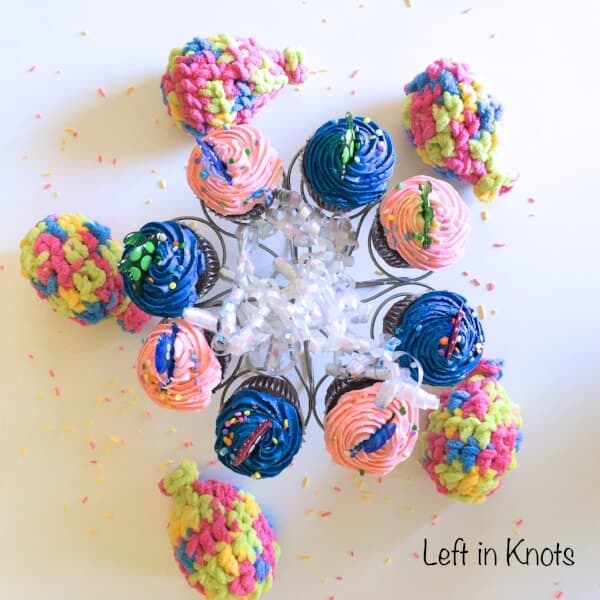 Crochet water balloons displayed with cupcakes