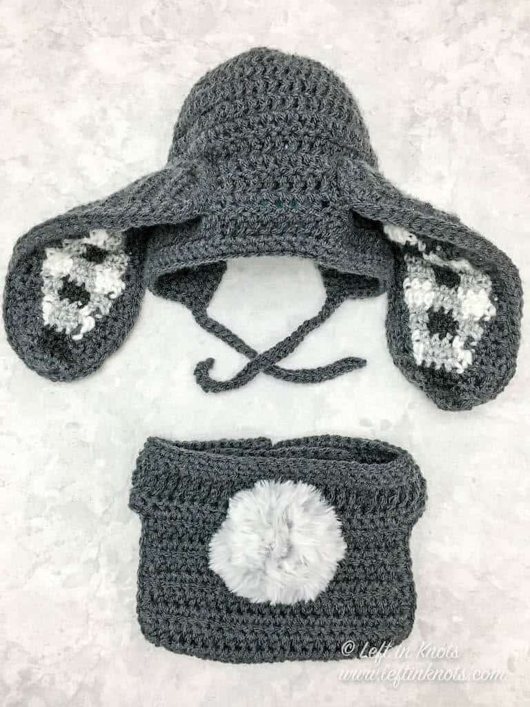 A crochet bunny bonnet with gingham plaid ears