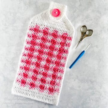 A colorful gingham plaid crochet cotton hand towel