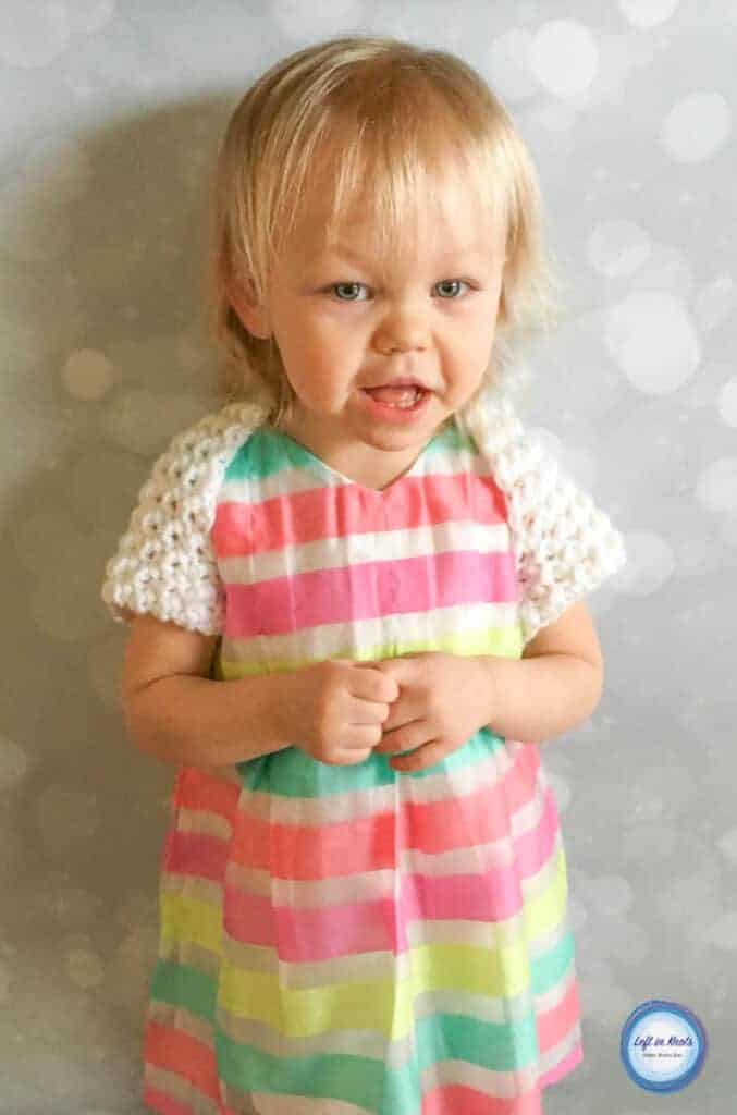 A crochet shrug sweater for toddlers