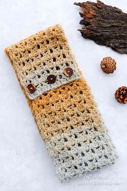 A buttoned crochet infinity scarf made with the V stitch
