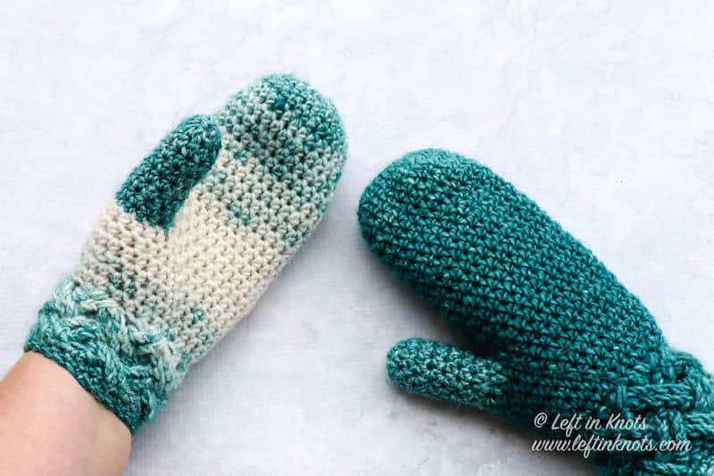 Teal and cream crochet mittens made with the Celtic weave stitch