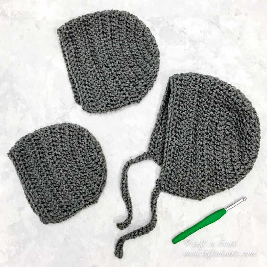 A crochet bonnet in sizes for baby children and adults
