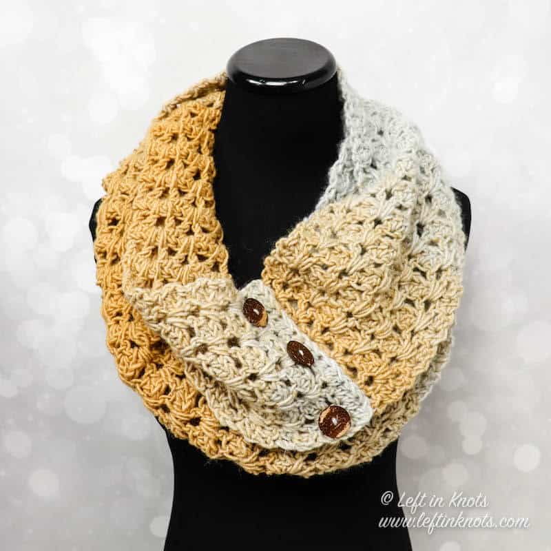 A buttoned crochet infinity scarf made with the V stitch