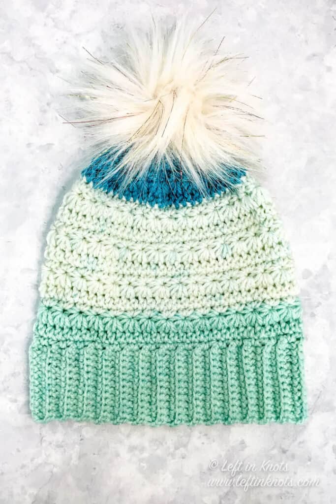 A crochet beanie made with Caron Cakes yarn and the star stitch