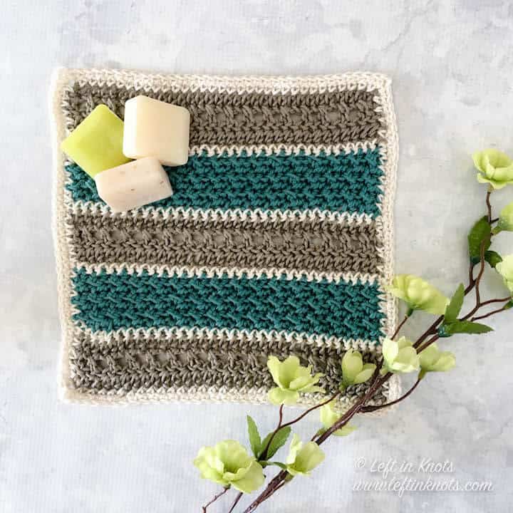 A textured crochet cotton wash cloth